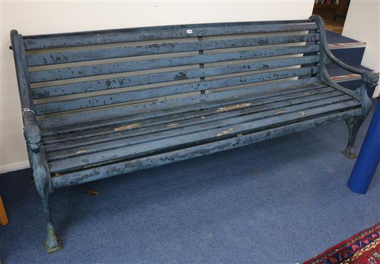 A Victorian cast iron and wooden slatted garden bench, W.210cm